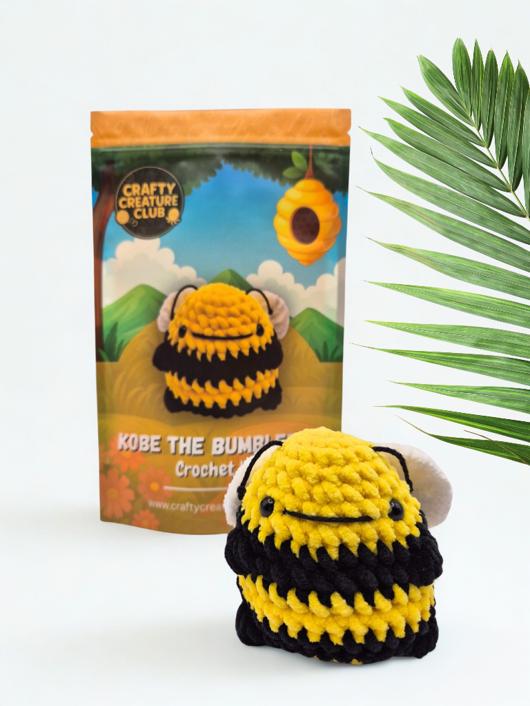 Kobe bumblebee crochet kit shown with packaging and finished plush bee